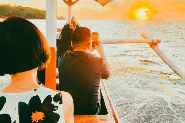 Sunset Cruise to Uluwatu Cliffside: Golden Horizon & Jimbaran Seafood Dinner photo 2