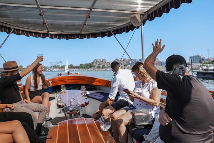 Silent Electric Boat Cruise in Montreal: Guided Waterfront Tour with Onboard Drinks photo 6