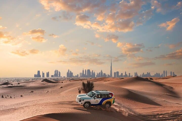 Dubai Evening Desert Safari in the Conservation Reserve — Camel Ride, Sandboarding & BBQ