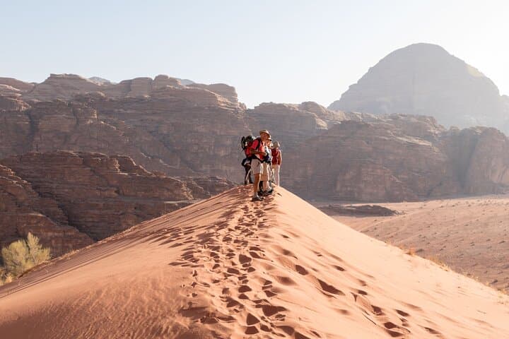 Wadi Rum Full-Day Jeep Tour: Sandboarding, Arches & Bedouin Camp Stay