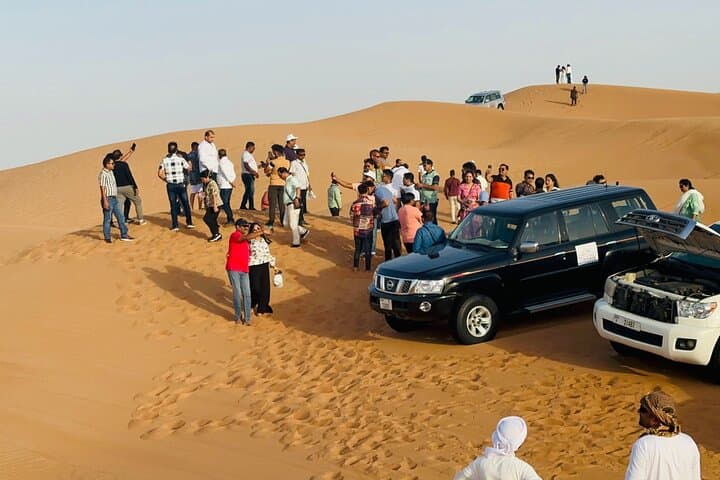 Dubai VIP Desert Safari with BBQ Buffet, Dune Bashing & Live Shows photo 3