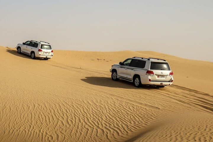 Private Sunrise Desert Safari in Dubai — Dune Bashing, Camel Ride & Breakfast photo 3