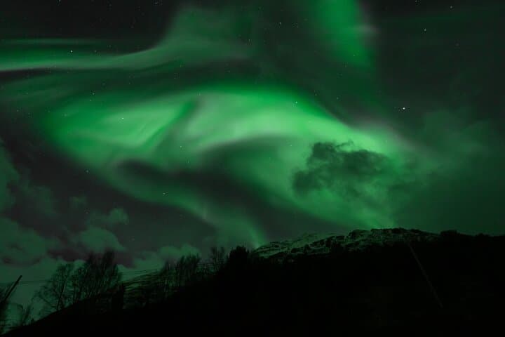 Tromsø Northern Lights Bus Tour: 7-Hour Guided Aurora Chase with Photos & Hot Drinks photo 2