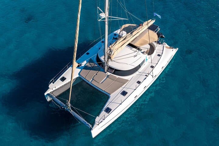 Mykonos Catamaran Private Day Cruise with Full Lunch & Open Bar to Rhenia and South Beaches photo 5
