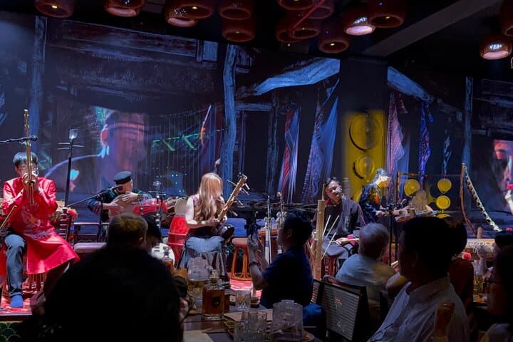 Evening Chao Show & Saigon Landmarks: Private Sightseeing Tour with Dinner photo 3