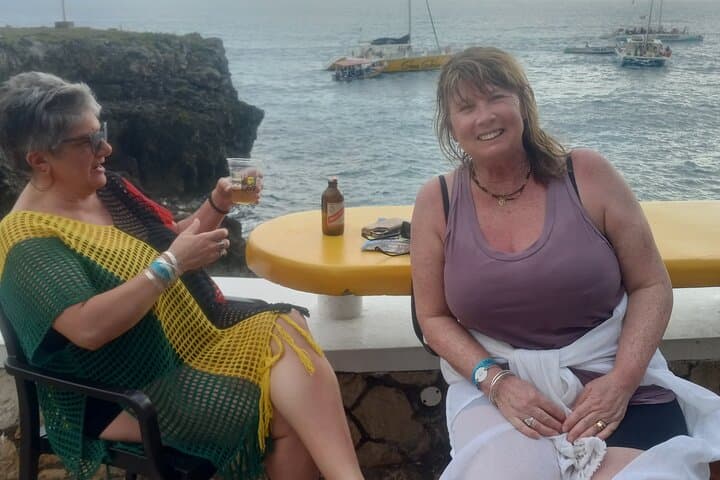 Negril Sunset at Rick's Cafe: Cliff Divers, Reggae, and Coastal Views photo 3