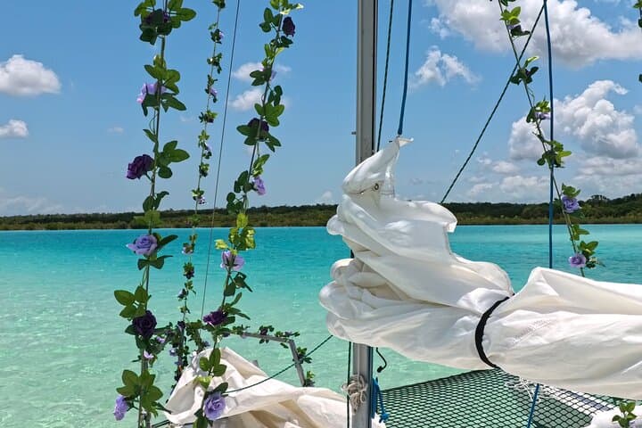 Secret Sail in Bacalar Lagoon: Stromatolites, Cenotes & Beach Club Picnic