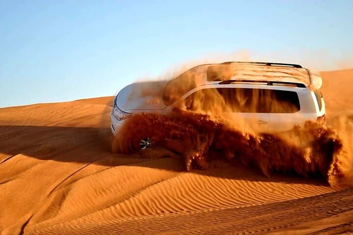Dubai Desert Safari: Dune Bashing, BBQ Dinner & Live Shows