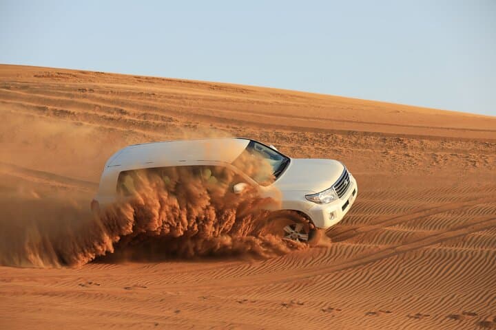 Abu Dhabi Desert Safari: Dune Bashing, Sandboarding & Bedouin BBQ Experience
