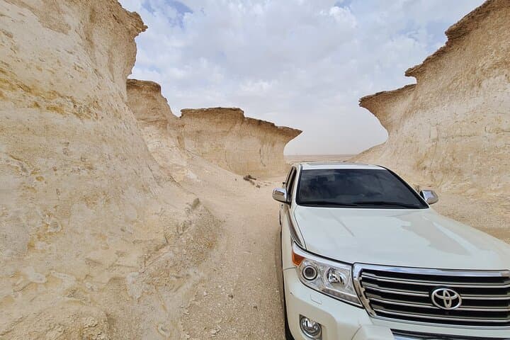 Zekreet West Coast Tour: Desert Cliffs, Richard Serra Sculpture & Camel Racing photo 6