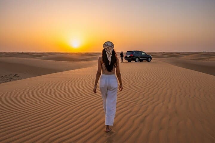 Dubai Sunset Desert Safari: Dune Bashing, Sandboarding & Camel Ride