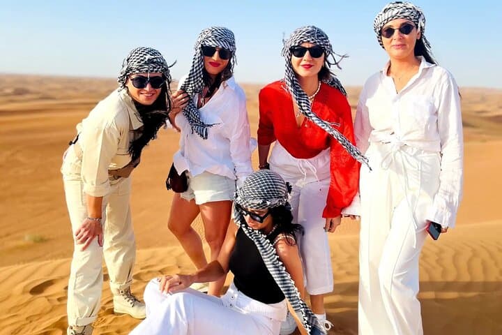 Dubai Desert Safari with Buffet Dinner: Dune Bashing, Camel Rides & Evening Camp photo 2