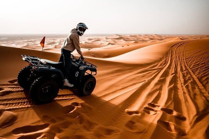 VIP Red Dunes Safari: Quad Biking, Camel Ride & Desert Dinner in Dubai photo 6