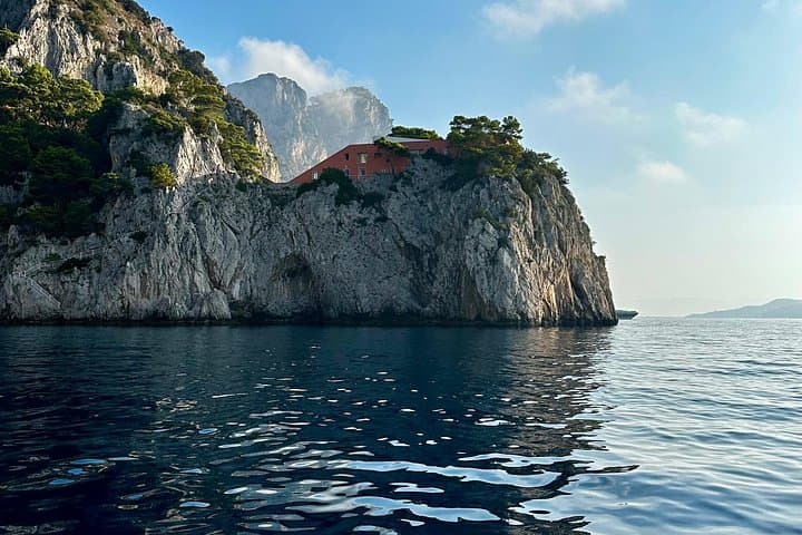 Private Capri Boat Tour: Circumnavigate Capri, Swim the Grottos, and See the Faraglioni photo 3