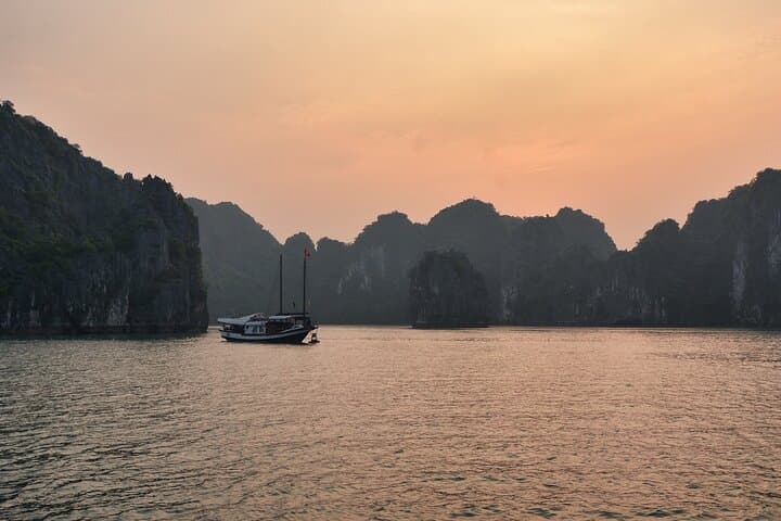 Hidden Bai Tu Long Bay: Private 2-Day Boutique Cruise through Limestone Wilderness photo 3