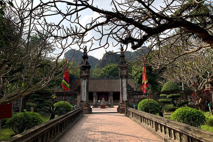 Hoa Lu & Tam Coc Full-Day: Ancient Temples, Bamboo Boat Ride & Countryside Cycling photo 4